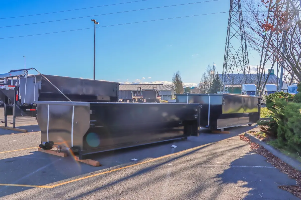 Roll-off dumpster ready for waste disposal at job site for Concrete Dumpster Rental in Decatur
